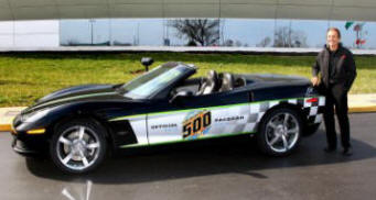 Two-time Indy 500 winner and Chevy's 2008 Indy 500 pace car driver Emerson Fittipaldi stands near his autograph at the rear of the Corvette 30th Anniversary Pace Car 